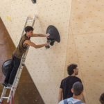 Pierre Broyer route setting for Set'n'Send Boulder Comp on Walltopia natural wood boulder in Sofia, Bulgaria